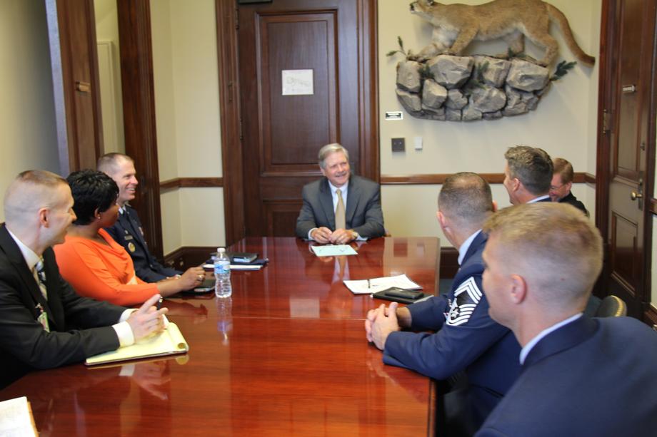 Minot Air Force Base Leaders-July 2014 - Senator Hoeven meets with Minot Air Force Base leaders to review and work on priorities important to the base. The base is in a growth mode because of the Nuclear Force Improvement Program (NFIP), and the senator is working to modernize and support the base so it can continue serving as a vital part of nation’s defense.